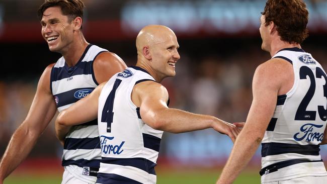 Tom Hawkins, Gary Ablett and Gary Rohan enjoy Geelong’s commanding win.