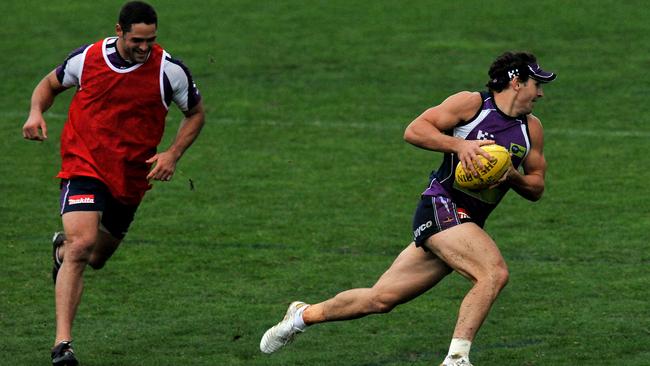 Billy Slater playing some AFL while at the Storm.