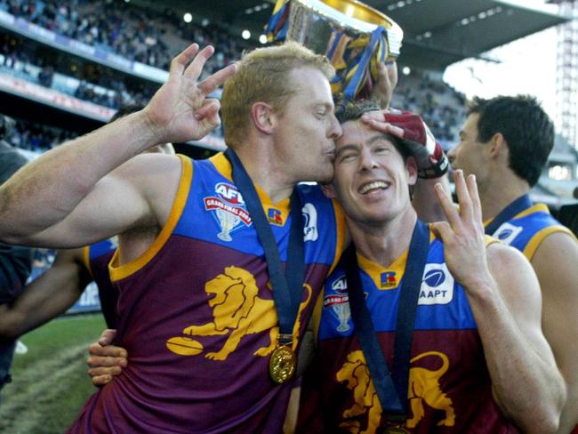 Brisbane Lions winners of the 2003 AFL Grand Final. Michael Voss and Craig Mcrae. Pic Kelly Barnes 27/09/03