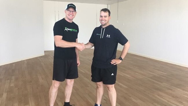 STAYING POSITIVE: Paul Timms with Got Active Fitness owner James Hargreaves.