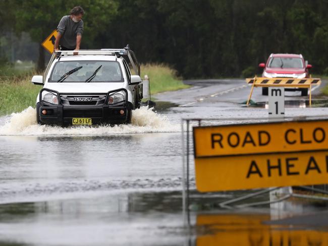 A flooded road at Lennox Head on Saturday. Widespread heavy rain has caused severe flood risks along the east coast. Picture: Jason O'Brien