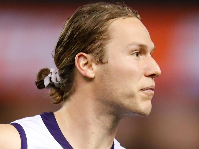 MELBOURNE, AUSTRALIA - AUGUST 11: Ed Langdon of the Dockers celebrates a goal during the 2019 AFL round 21 match between the St Kilda Saints and the Fremantle Dockers at Marvel Stadium on August 11, 2019 in Melbourne, Australia. (Photo by Michael Willson/AFL Photos via Getty Images)