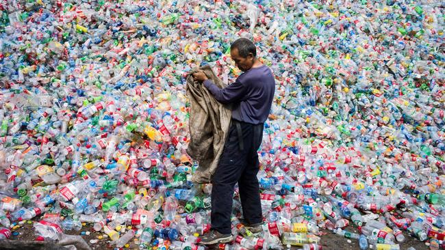 China will no longer accept Western garbage and plastic bottles like the mountain of debris at this village on the outskirts of Beijing.