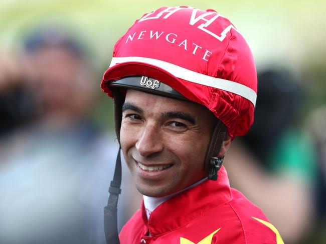 SYDNEY, AUSTRALIA - SEPTEMBER 23: Joao Moreira riding Militarize celebrates winning Race 8 The KIA Golden Rose during Sydney Racing at Rosehill Gardens on September 23, 2023 in Sydney, Australia. (Photo by Jason McCawley/Getty Images)