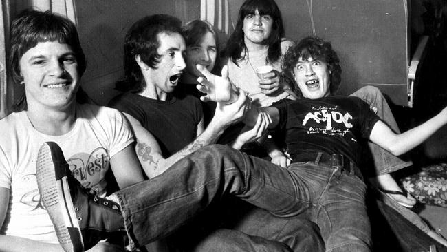 AC/DC in 1976, from left, Mark Evans, Bon Scott, Phil Rudd, Malcolm Young and Angus Young. Picture: Gary Graham