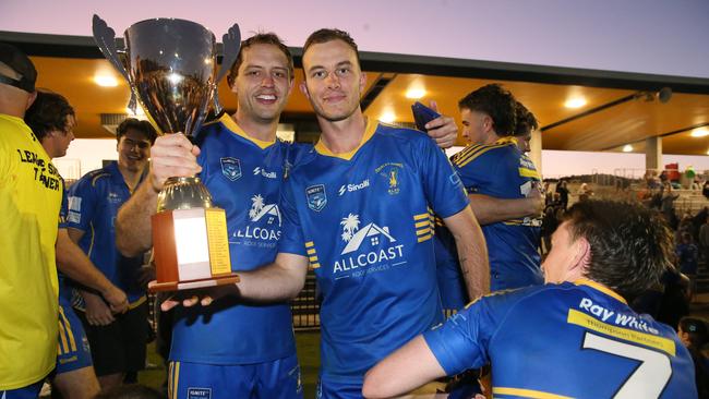 Griffin (left), pictured with Aaron Heaven, after the grand final victory. Picture: Sue Graham