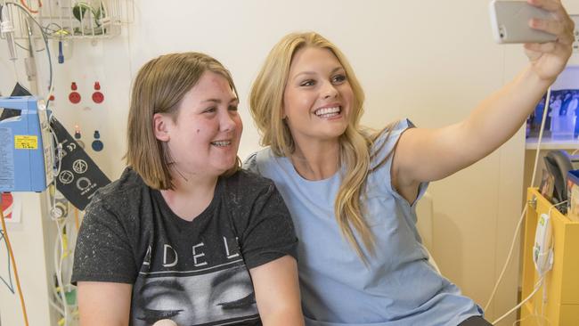 Home &amp; Away actor Sophie Dillman — who used to be a nurse — visits Zoe Tracy, 13, at the hospital. A host of Seven talent is part of the Good Friday appeal. Picture: Jason Edwards