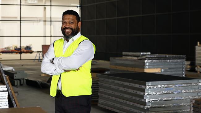 Screen Queensland board member and actor Aaron Fa'aoso on the site of the new sound stage and production facilities under construction. Picture: Brendan Radke