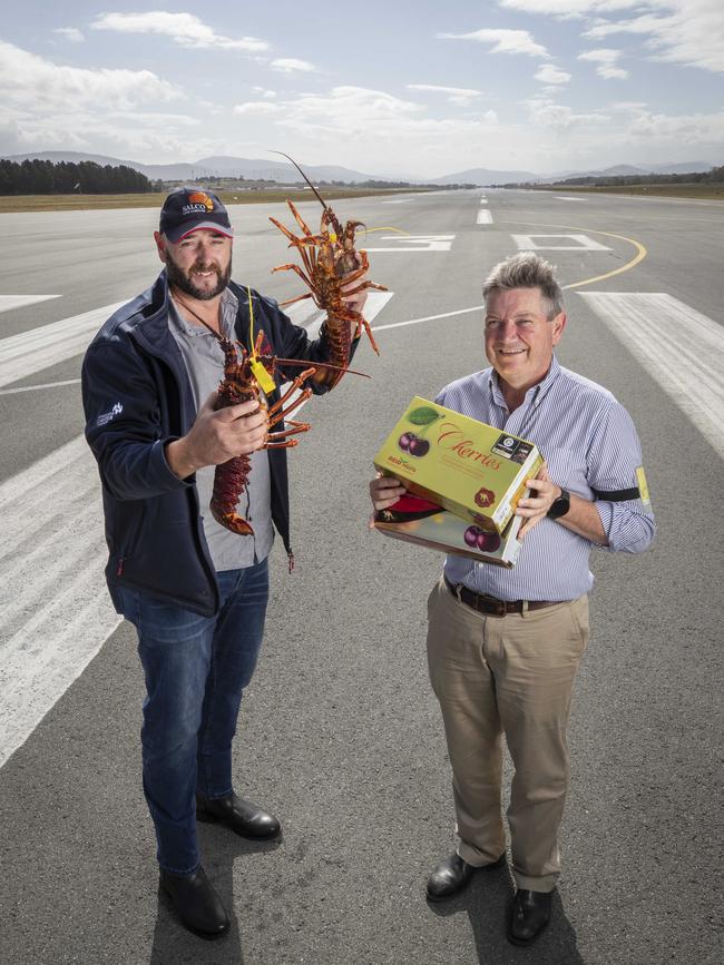 Tasmanian Rock Lobster Processors Association President Michael Blake and Reid Fruits marketing manager Tony Coad are among advocates for runway upgrades at Hobart International Airport. Picture: Chris Kidd.