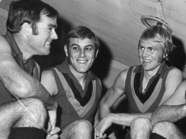 Back in 1976 Neil Kerley, left, was the SA State football coach, with players Malcolm Blight and Graham Cornes stars in the team. They are reuniting to try to beat the Victorians in the 2018 EJ Whitten Legends game.