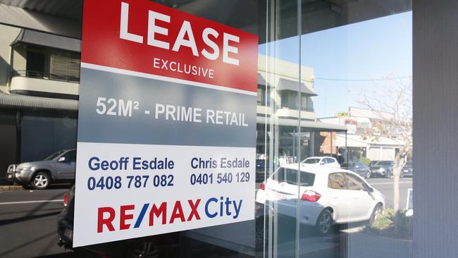 'For Lease' signs on restaurant facades on Given Terrace in Paddington. Picture: AAP