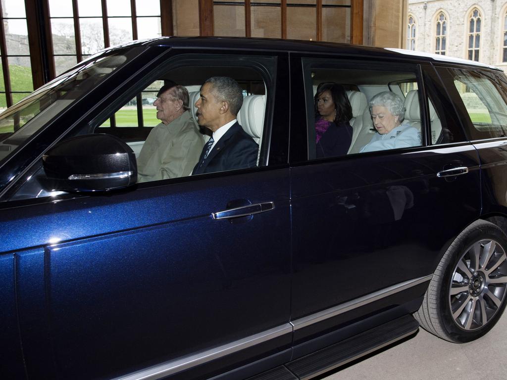 Prince Philip drives the Queen and the Obamas to a private lunch at Windsor Castle in 2016. Picture: Getty Images