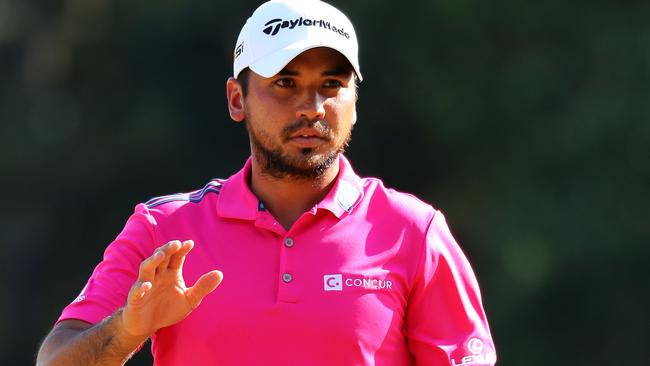 Jason Day of Australia reacts to his birdie on the 12th green during the final round.