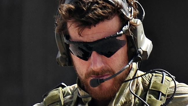 SAS Corporal Ben Roberts-Smith VC, MG, with the Australian Special Operations Task Group, leaves a UH-60 Blackhawk helicopter during preparation of the Shah Wali Kot offensive in Afghanistan, 06/2010. Roberts-Smith was later awarded the Victoria Cross during action in saving the lives of wounded comrades.