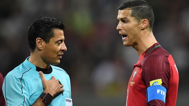 Faghani laying down the law to superstar Cristiano Ronaldo at the 2017 Confederations Cup in 2017. Picture: AFP