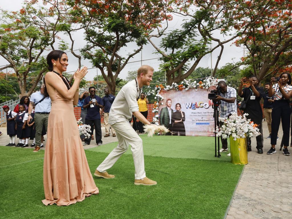 Meghan Markle and Prince Harry on their royal tour in Nigeria. (Photo by Andrew Esiebo/Getty Images for The Archewell Foundation)