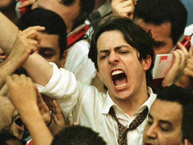 Traders yell orders at the floor of Brazil's Bovespa stock market in the city of Sao Paulo, Brazil Thursday, Sept. 17, 1998. Brazilian share prices plummeted in early trading Thursday, following poor performances on Wall Street and other foreign markets. Soon after trading began at the Sao Paulo Stock Exchange, Latin America's largest, share prices were down 8.9 percent. After the benchmark Bovespa Index plunged 10 percent in the first hour of operations, trading was automatically suspended for 30 minutes. (AP Photo/Dario Lopez-Mills)