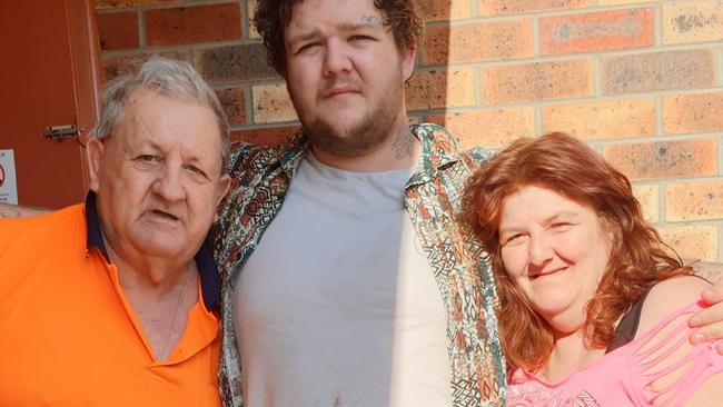 Alleged Burnie murder victim Bobby Medcraft (centre), with his grandfather and mum Leeanne. Picture: Facebook