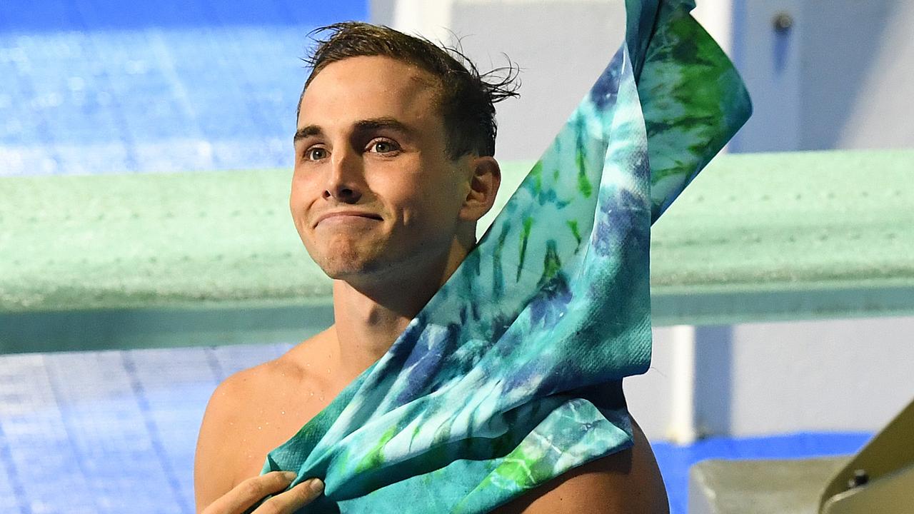 Australia’s Domonic Bedggood celebrates winning gold in the 10m platform on Saturday night.