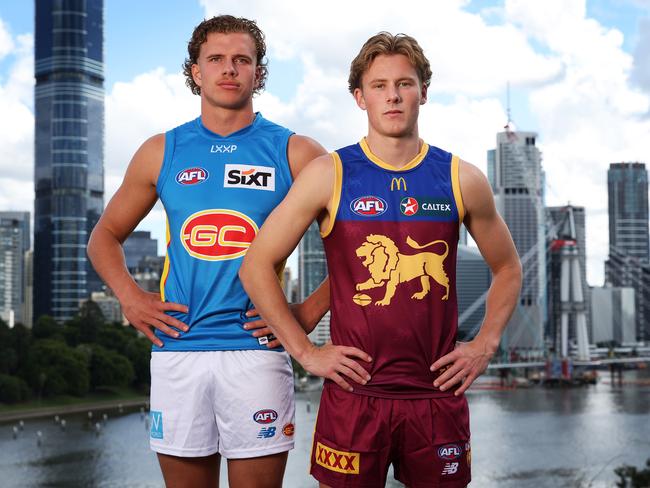 Gold Coast’s Jed Walter and Brisbane Lion Jaspa Fletcher at Kangaroo Point ahead of the Q Clash. Picture: Liam Kidston