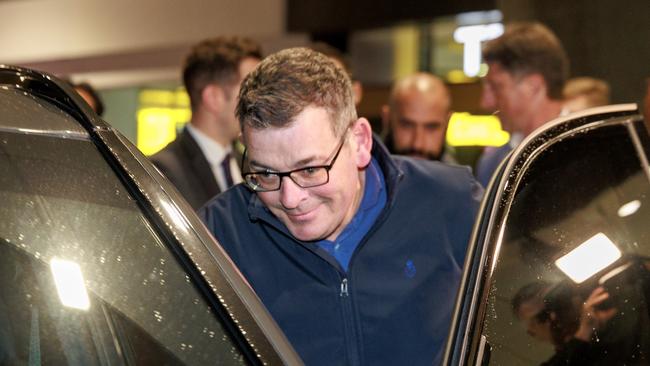 Premier Daniel Andrews arrives at Melbourne airport after returning from a visit to China. Picture: David Geraghty