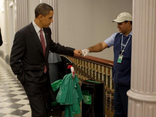 Obama fistbumps a White House custodian. Picture: Pete Souza/White House