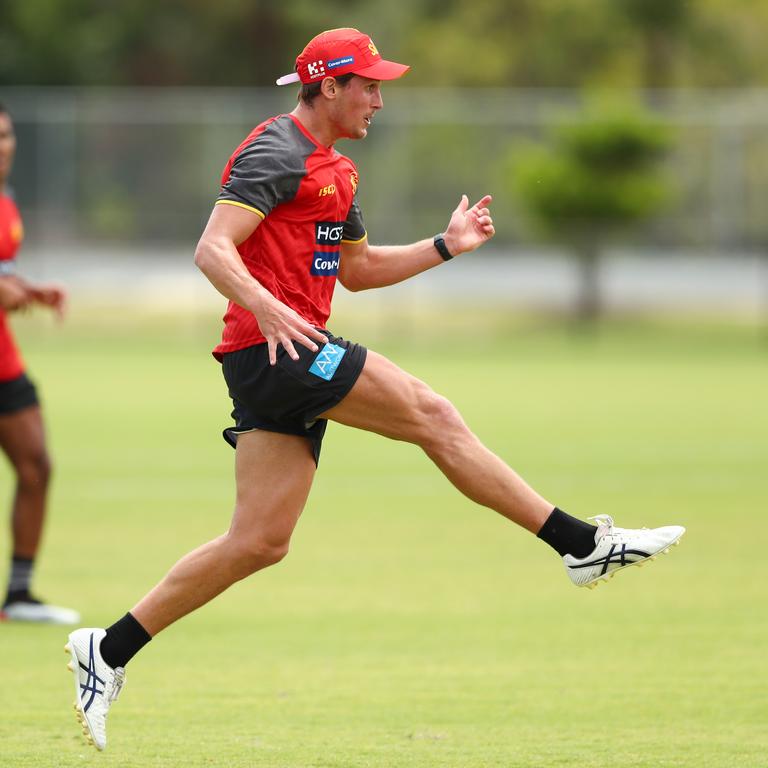 David Swallow kicks during a Gold Coast Suns AFL media and training session at Metricon Stadium on November 04, 2019 in Gold Coast, Australia. (Photo by Chris Hyde/Getty Images)