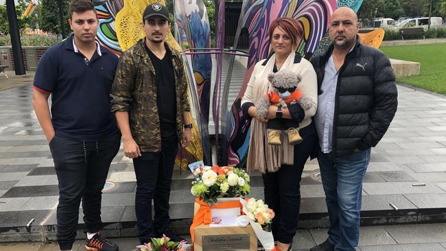 On the one year anniversary of his death, Mrs Cassaniti along with her husband Robert, and two sons, Michael and Adriano went to the site on Wednesday placing flowers on a plaque set up by the City of Ryde opposite the Lachlan’s Line site. Picture: Supplied