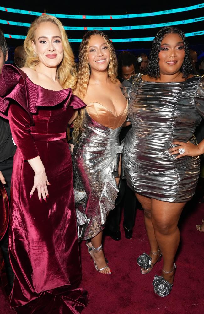 Behold pop royalty at the Grammys – Lizzo with her girls Adele and Beyonce. Picture: Getty Images