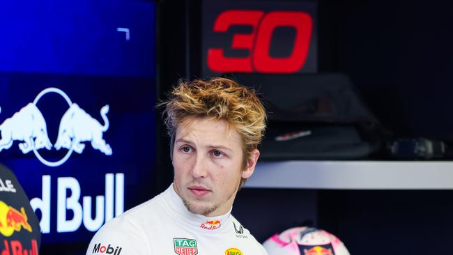 BAHRAIN, BAHRAIN - FEBRUARY 26: Liam Lawson of New Zealand and Oracle Red Bull Racing looks on in the garage during day one of F1 Testing at Bahrain International Circuit on February 26, 2025 in Bahrain, Bahrain. (Photo by Mark Thompson/Getty Images)