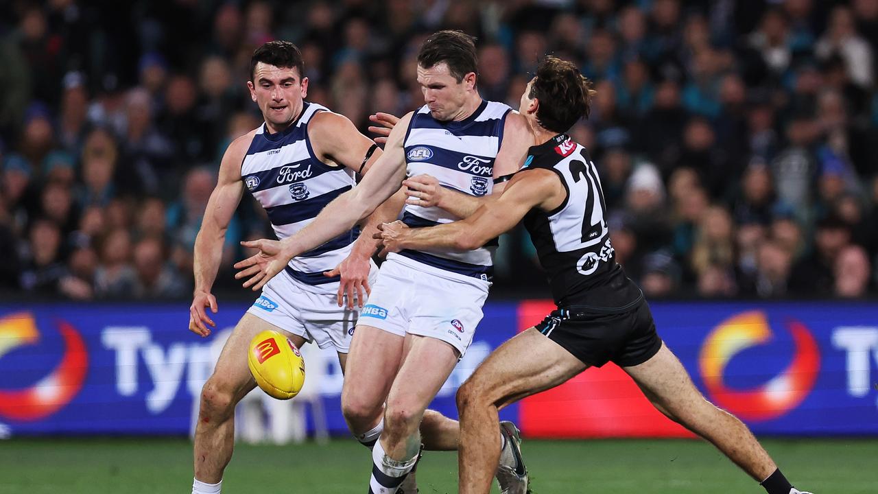 ADELAIDE, AUSTRALIA - JUNE 15: Patrick Dangerfield of the Cats is tackled by Connor Rozee of the Power during the 2023 AFL Round 14 match between the Port Adelaide Power and the Geelong Cats at Adelaide Oval on June 15, 2023 in Adelaide, Australia. (Photo by James Elsby/AFL Photos via Getty Images)