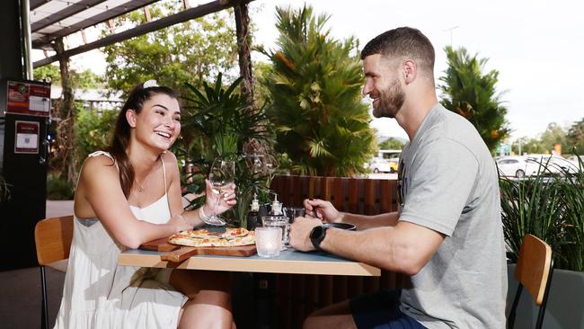 The northern beaches of Cairns and surrounding suburbs have seen a massive growth in population in the past 10 years. Layla Eady of Trinity Beach catches up with her friend Grant Coldstream of Earlville. Picture: Brendan Radke