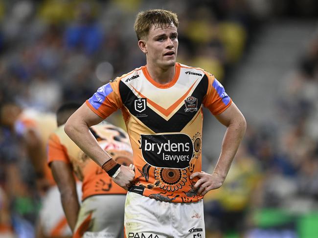 TOWNSVILLE, AUSTRALIA - MAY 24: Lachlan Galvin of the Tigers looks on after a Cowboys try during the round 12 NRL match between North Queensland Cowboys and Wests Tigers at Qld Country Bank Stadium, on May 24, 2024, in Townsville, Australia. (Photo by Ian Hitchcock/Getty Images)