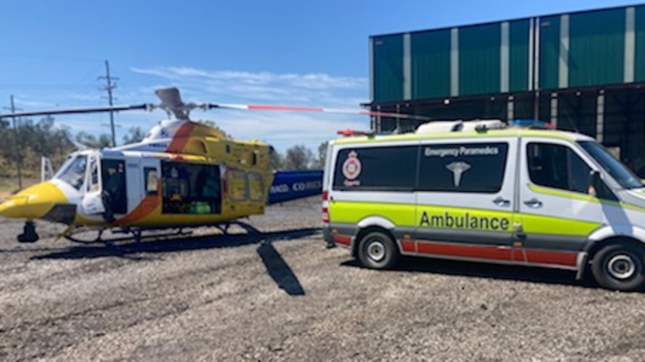 A worker suffered serious rib, abdominal and lung injuries after being crushed between the dual tyres and frame of a large haul truck. Picture: RACQ CQ Rescue