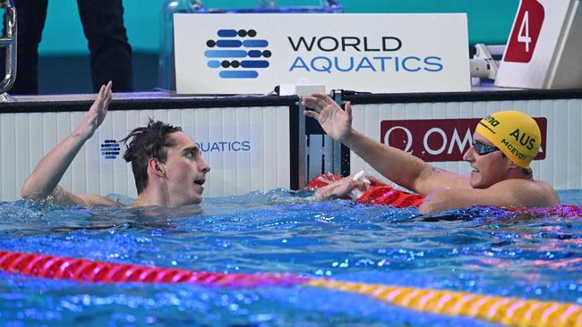 Ukraine's Vladyslav Bukhov is congratulated by Australia's Cam McEvoy.