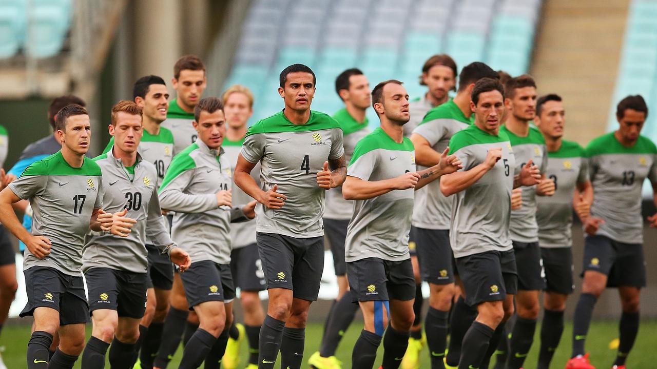 SYDNEY, AUSTRALIA - MAY 25: Australian players warm up during an Australian Socceroos training session at ANZ Stadium on May 25, 2014 in Sydney, Australia. (Photo by Brendon Thorne/Getty Images)