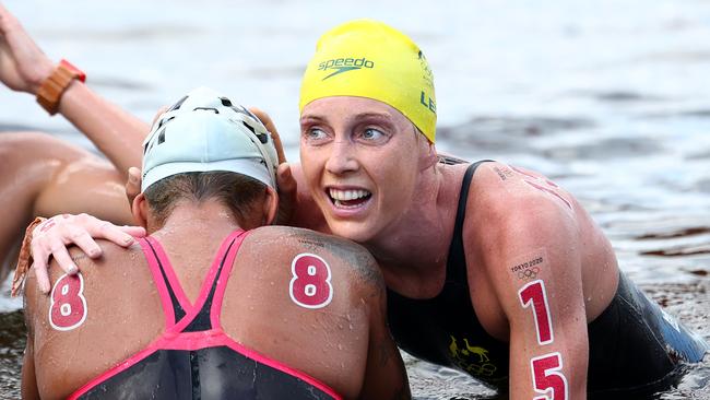 TOKYO, JAPAN - AUGUST 04: Ana Marcela Cunha of Team Brazil reacts with Kareena Lee of Team Australia after competing in the Women's 10km Marathon Swimming on day twelve of the Tokyo 2020 Olympic Games at Odaiba Marine Park on August 04, 2021 in Tokyo, Japan. (Photo by Clive Rose/Getty Images)