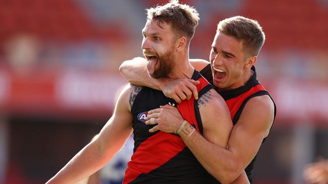 Jake Stringer celebrates with Matt Guelfi after kicking one of his three final quarter goals. Picture: Michael Klein