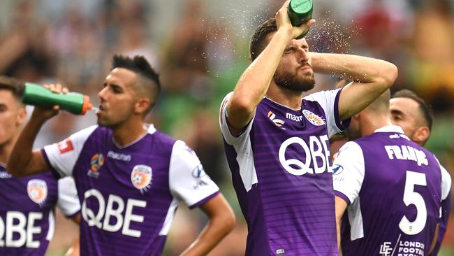 Perth Glory players deal with the heat in Melbourne in March. Picture: AAP