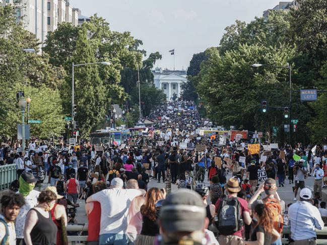 Demonstrators protest near the White House. Picture: AP