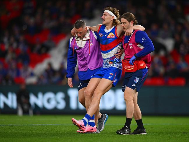 Naughton needed help to come from the ground. (Photo by Morgan Hancock/Getty Images)