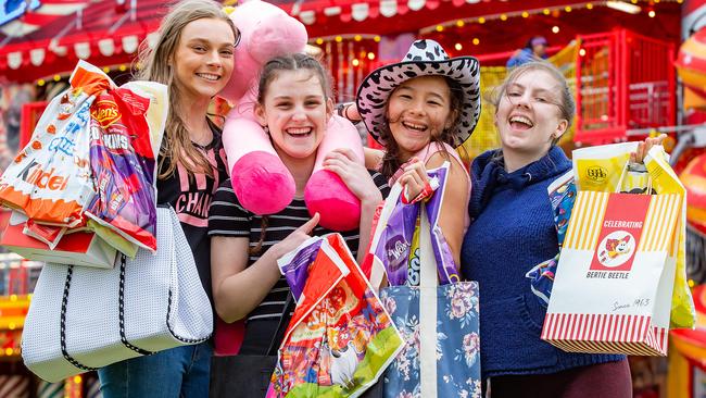 Day 1 Royal Melbourne show. Friends loaded up with show bags, have a blast at the show, L-R Tara Darcy,17, Sarah Scott,16, Elentari Berryman,16 and Loiuse Casey, 17  Picture: Sarah Matray