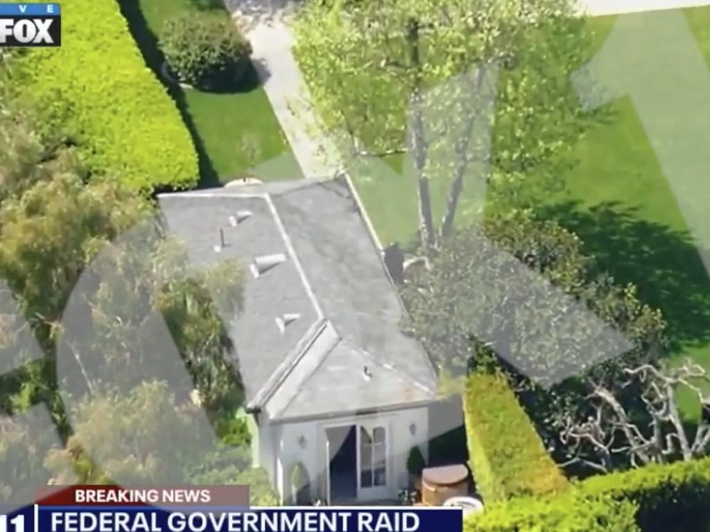 Federal authorities during the raid on Comb’s LA mansion. Picture: FOX 11