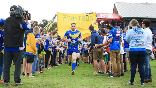 Murwillumbah Mustangs Captain Sam O'Dea leads the Mustangs out during the Northern Rivers Rugby League Grand Final against the Cudgen Hornets at Cudgen.