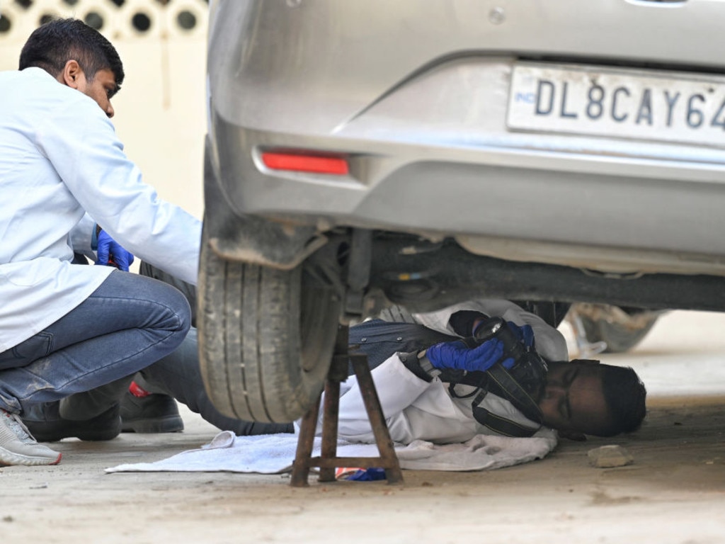 Officials recreating the scene of reported accident with the baleno car resulting the death of Anjali Singh at Sultanpuri Police Station on January 4, 2023 in New Delhi. (Photo by Sanchit Khanna/Hindustan Times via Getty Images)