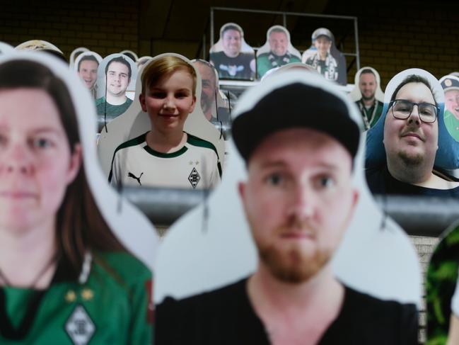 Cardboard cut-outs of fans in a soccer stadium in Germany. Picture: AFP