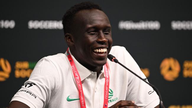 Australia's Thomas Deng reacts during a press conference in Doha on November 14, 2022, ahead of the Qatar 2022 World Cup football tournament. (Photo by Paul ELLIS / AFP)