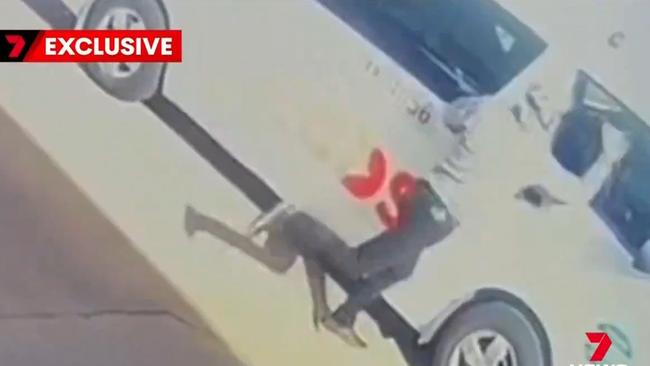 CCTV showing a man punch the window of a taxi at Plympton Park. Picture: 7NEWS