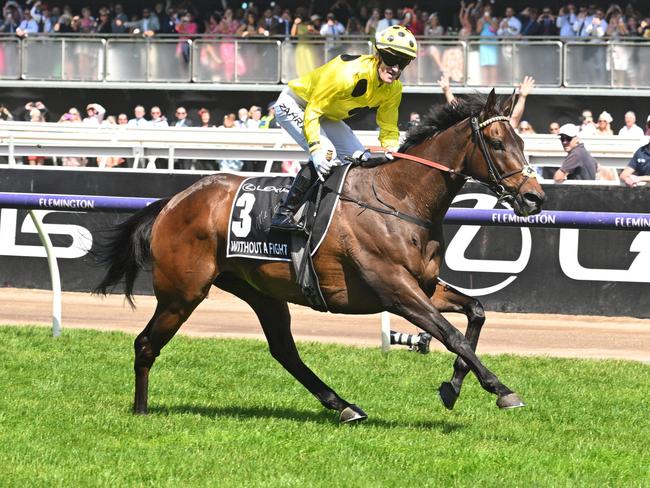 MELBOURNE, AUSTRALIA - NOVEMBER 07: Mark Zahra riding Without A Fight winning Race 7, the Lexus Melbourne Cup,  during Melbourne Cup Day at Flemington Racecourse on November 07, 2023 in Melbourne, Australia. (Photo by Vince Caligiuri/Getty Images)