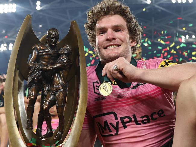 SYDNEY, AUSTRALIA - OCTOBER 06:  Liam Martin of the Panthers poses with the Provan-Summons Trophy after winning the 2024 NRL Grand Final match between the Melbourne Storm and the Penrith Panthers at Accor Stadium on October 06, 2024, in Sydney, Australia. (Photo by Cameron Spencer/Getty Images)